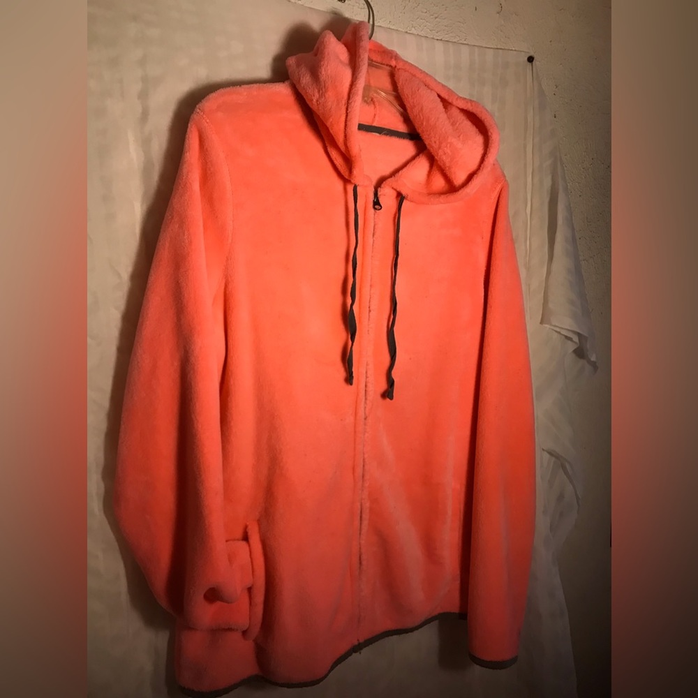 Soft Fleece Women’s Light  Jacket Front Zipper Hoodie. Color is Bright Coral